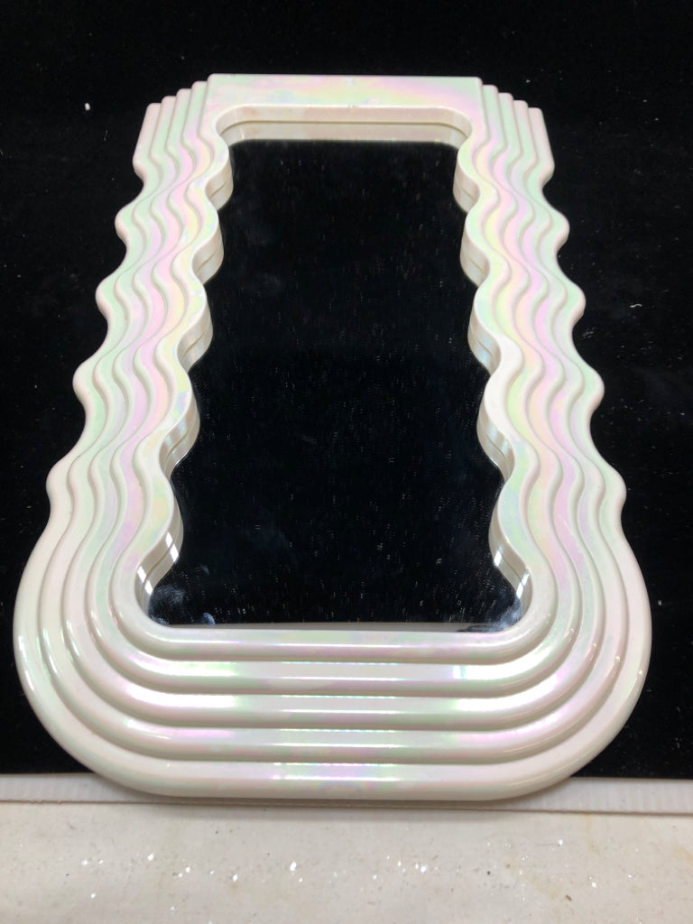 IRIDESCENT WAVY PLASTIC MIRROR.