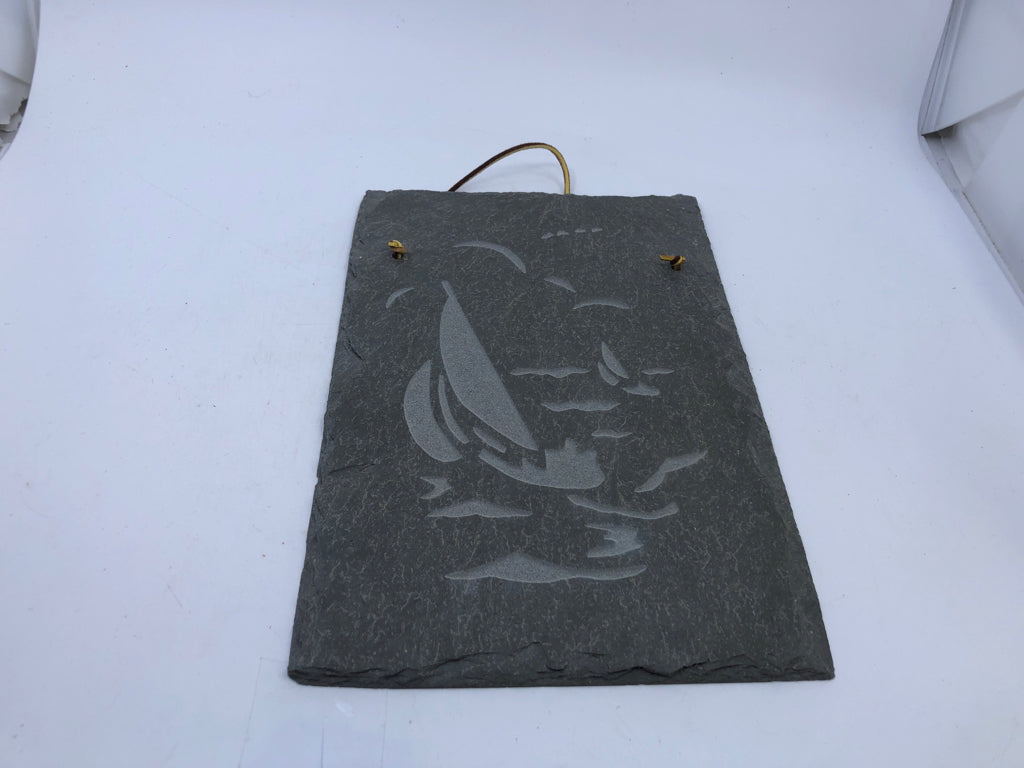CARVED SAILBOAT ON SLATE.
