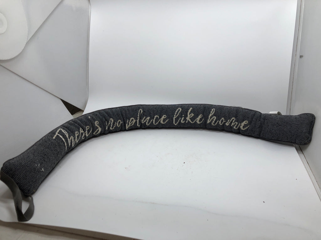NO PLACE LIKE HOME WEIGHTED DOOR DRAFT STOPPER.