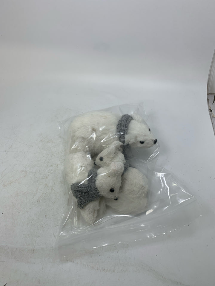 3 WHITE FURRY ANIMALS IN BAG W/ GREY SCARFS.