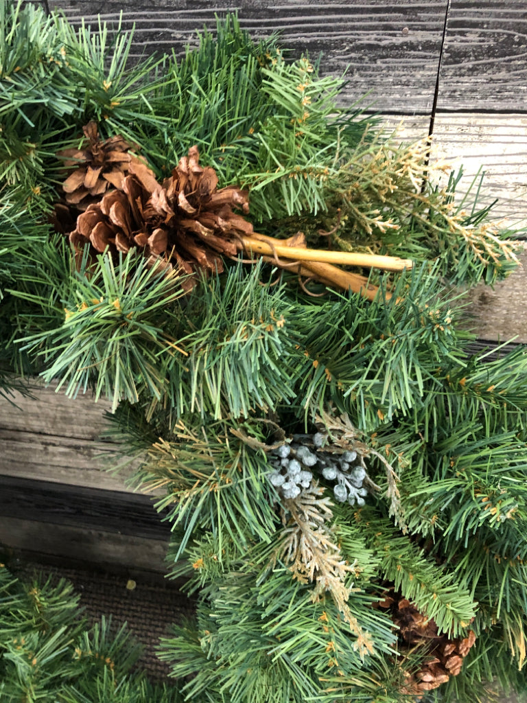 LARGE WREATH W/PINECONES AND TWIGS.