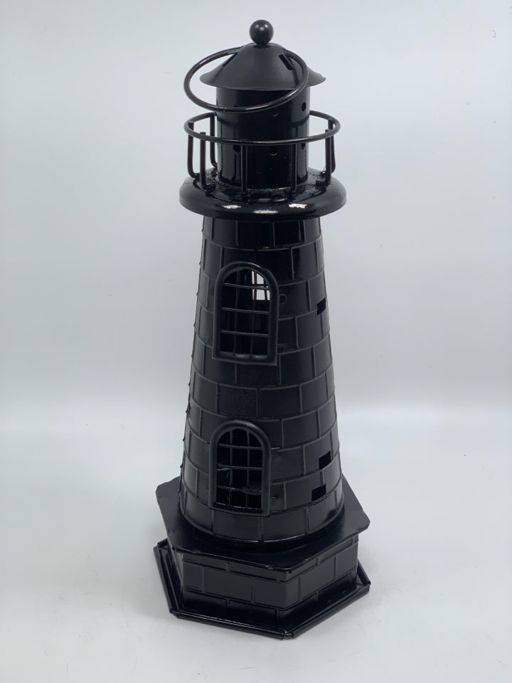 BLACK METAL LIGHTHOUSE TEA LIGHT HOLDER.