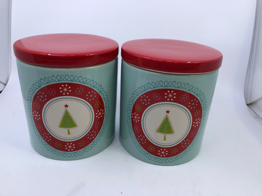 2 CHRISTMAS TREE CANISTERS.