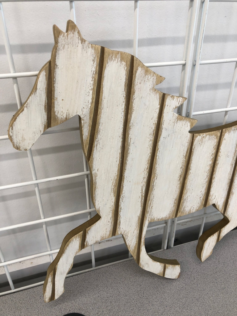 DISTRESSED WOODEN HORSE HANGING.