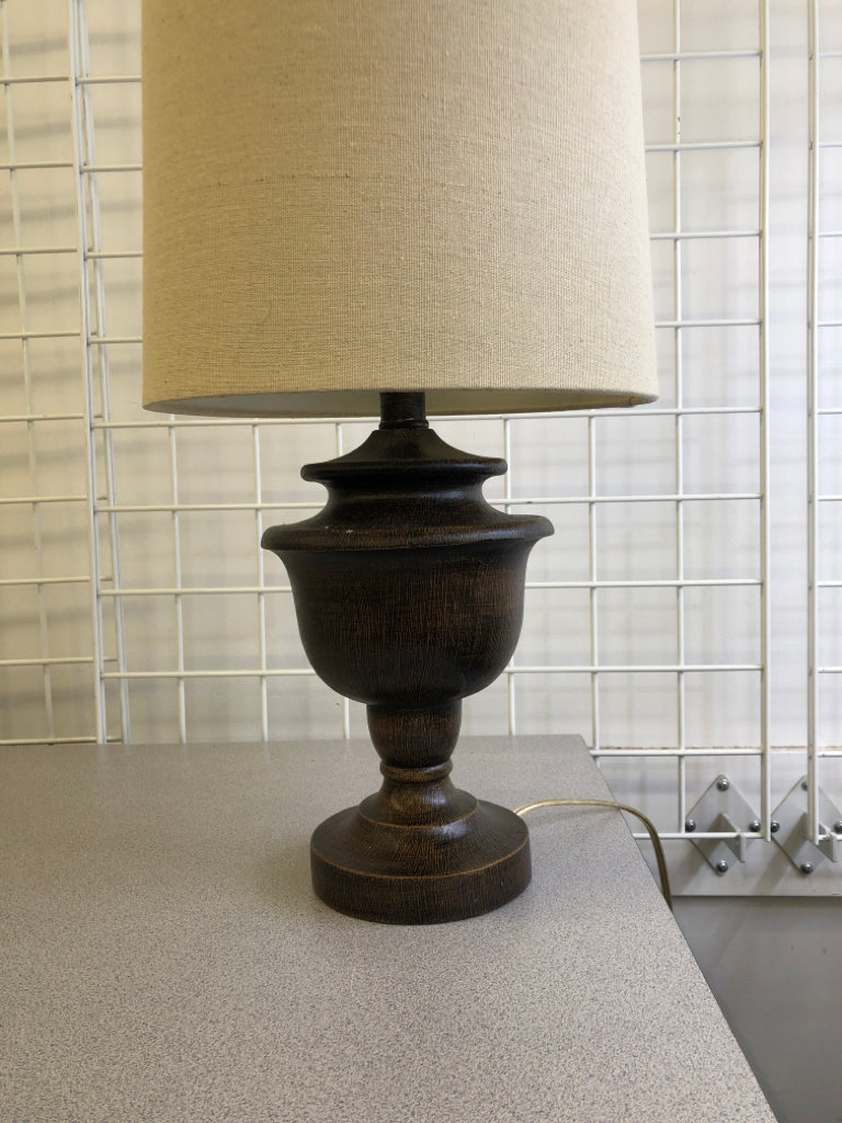 BROWN BASE LAMP W CREAM SHADE.