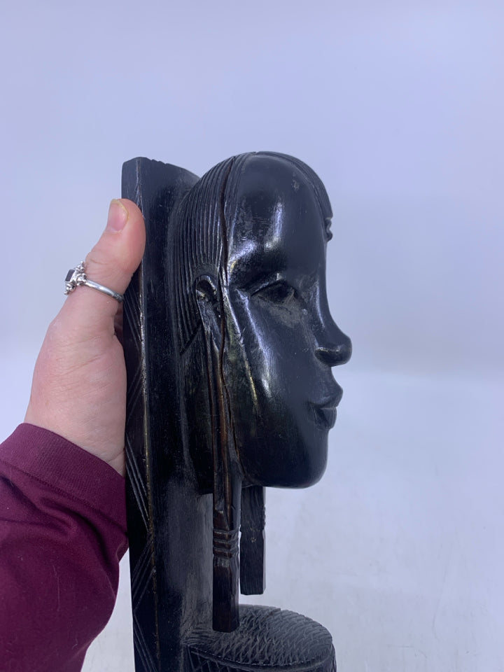 HEAVY BLACK WOOD CARVED FACE W/ FLAT EDGE FOLK AR BOOK END.