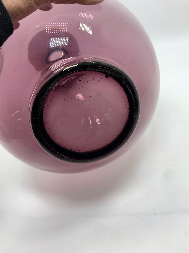CURVED PURPLE GLASS VASE.