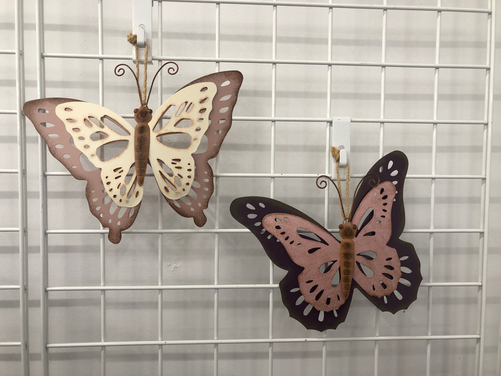 2 PINK METAL BUTTERFLY WALL HANGING.