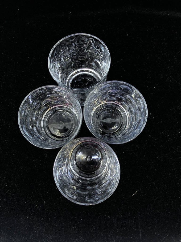4 SHORT CLEAR GLASSES W/ CIRCLE DESIGN.