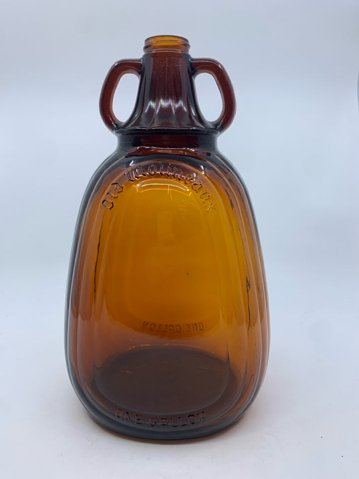 BROWN GLASS BOTTLE 2 HANDLES.