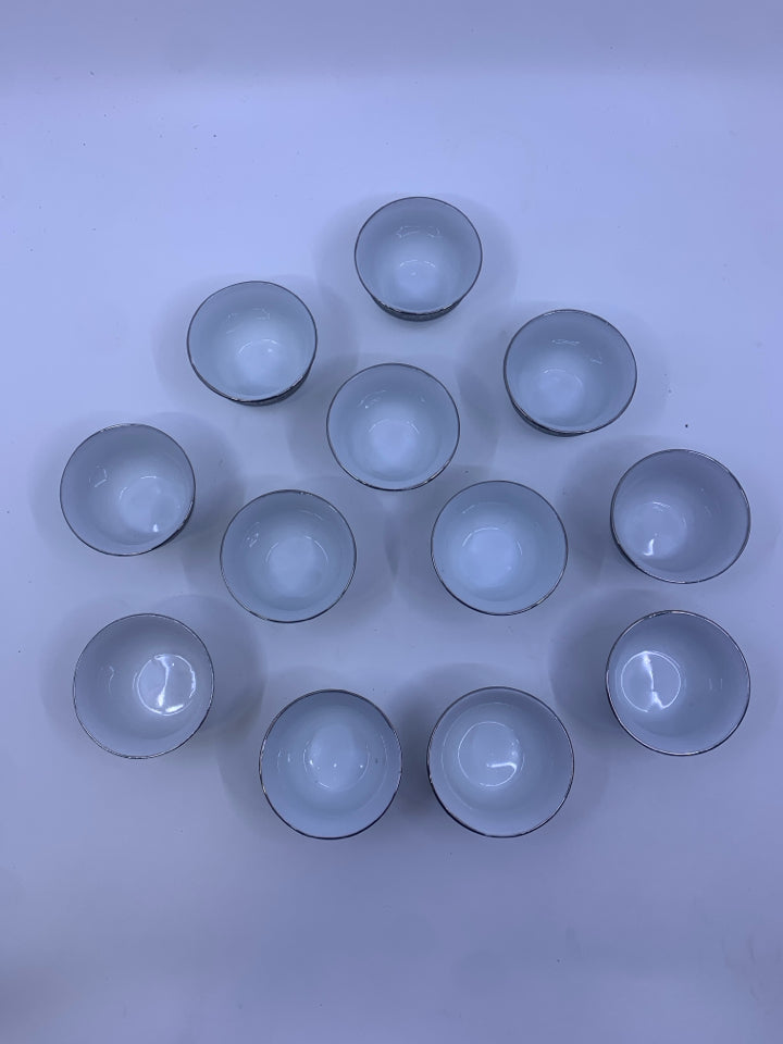 12 SAKE CUPS SILVER TRIM.