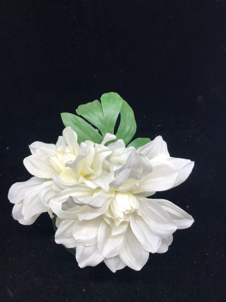 FAUX WHITE FLOWERS IN GLASS VASE.