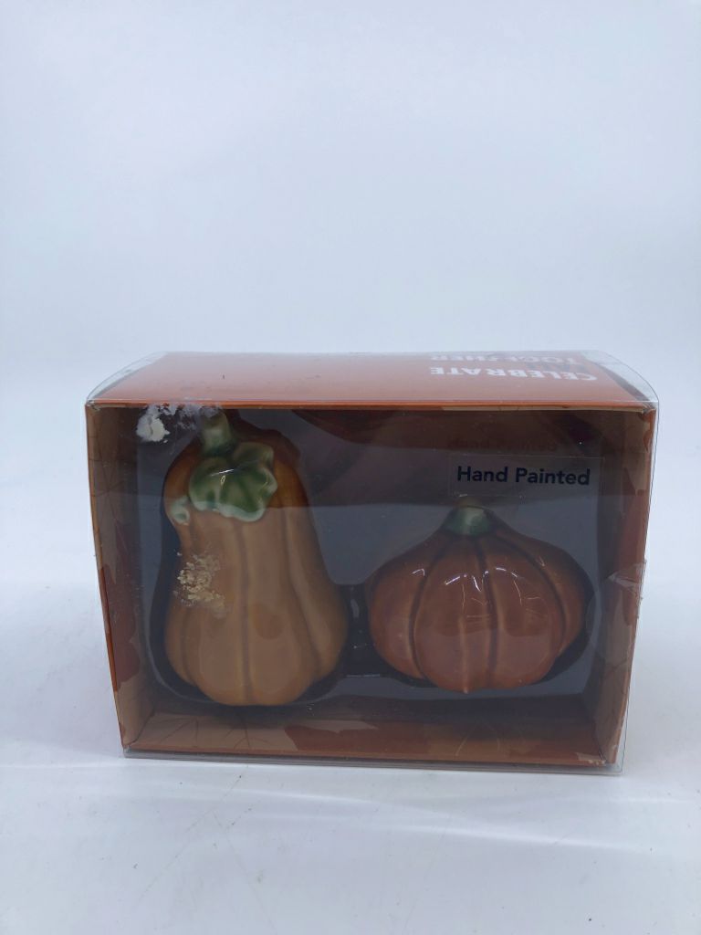 NIP PUMPKIN SALT AND PEPPER SHAKERS.