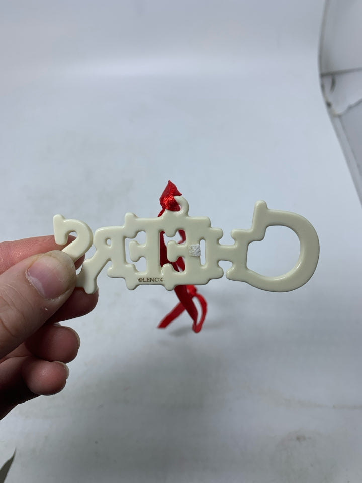 IVORY LENOX CHEERS ORNAMENT.