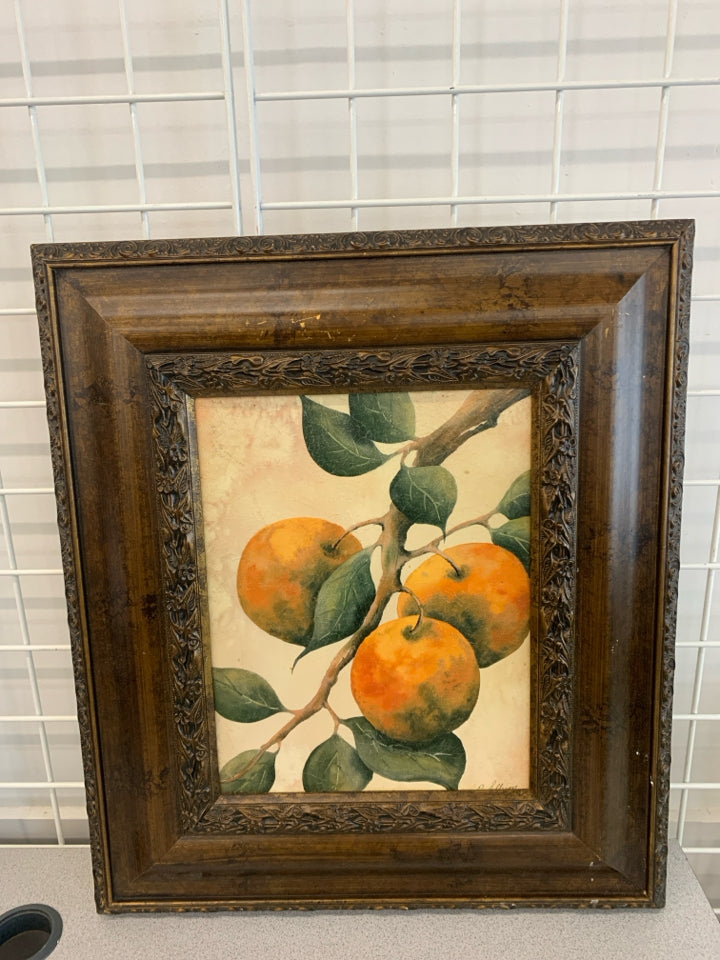 ORANGES PAINTING IN ORNATE BROWN WOOD FRAME.
