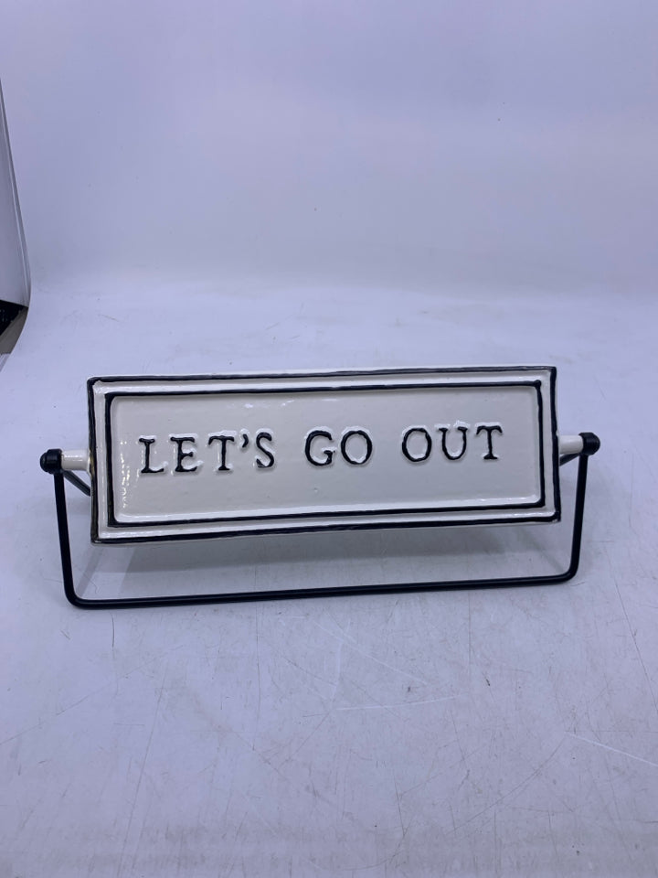 BLACK/WHITE METAL SIGN LETS GO/STAY.