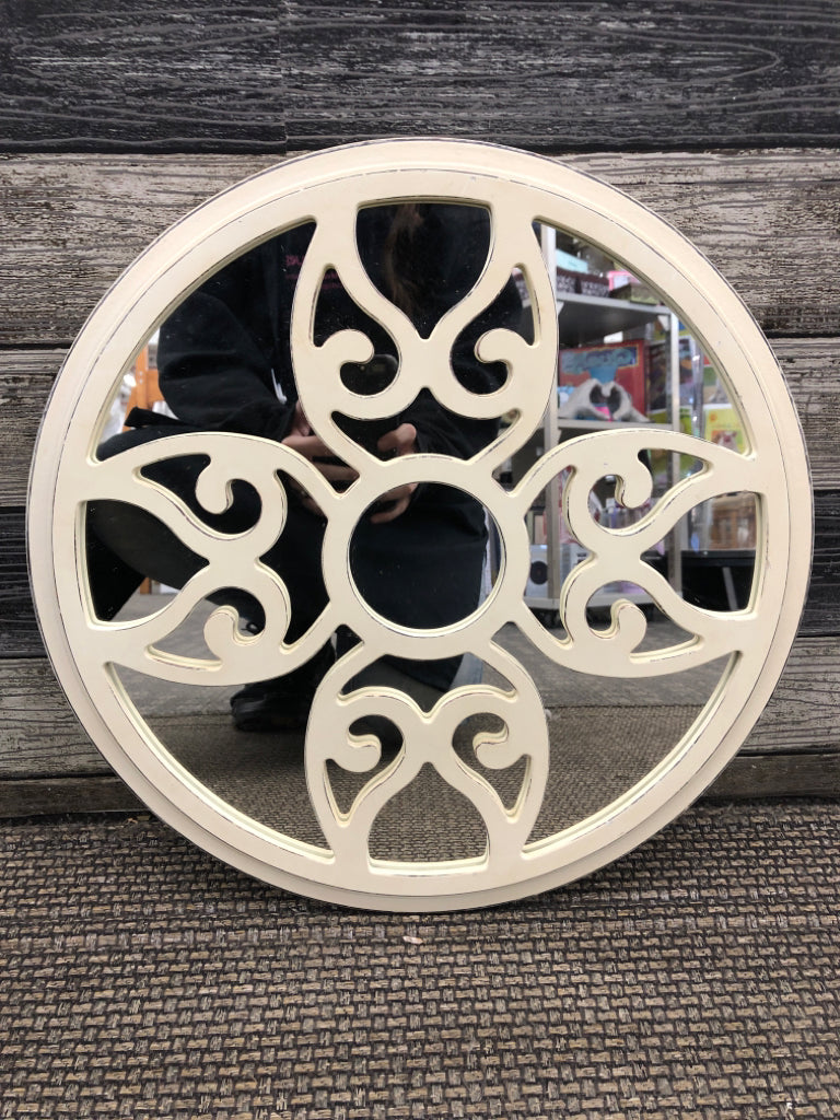 ROUND CREAM SCROLL MIRROR.