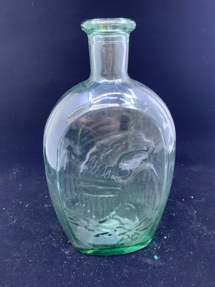 EMBOSSED GLASS BOTTLE.