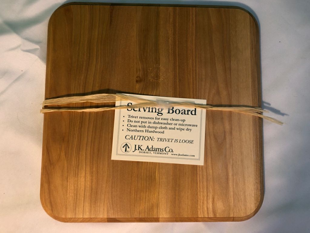 NEW WOOD CHEESE BOARD W/ SLATE IN CENTER.