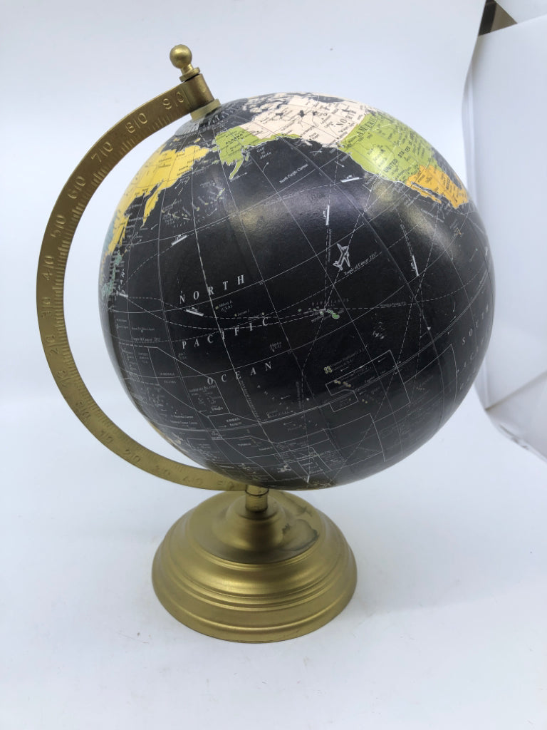 BLACK GLOBE ON GOLD STAND.