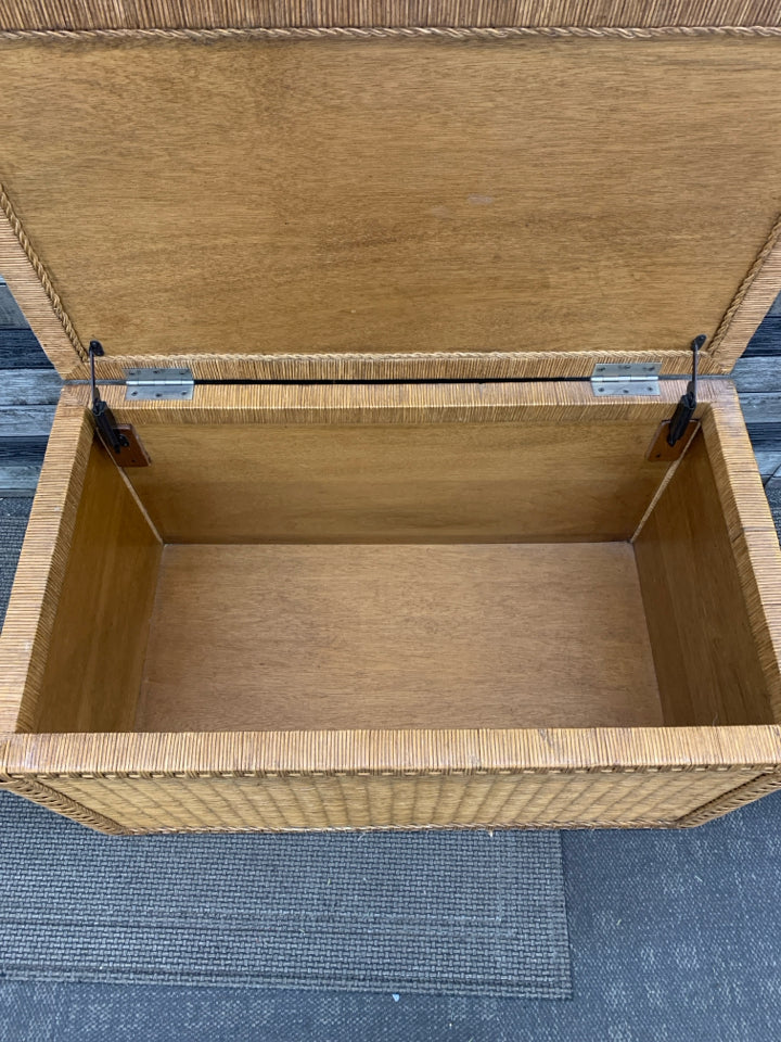 WICKER STORAGE CHEST W/METAL HANDLES.