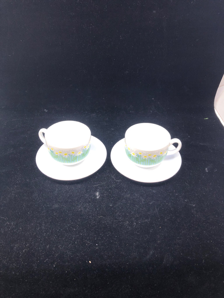 2 WHITE DAISIES TEA CUP AND SAUCERS.