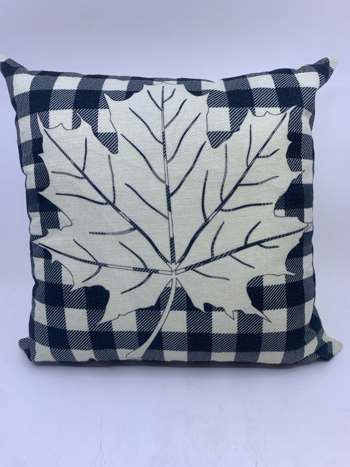 BLACK AND CREAM LEAF PILLOW.