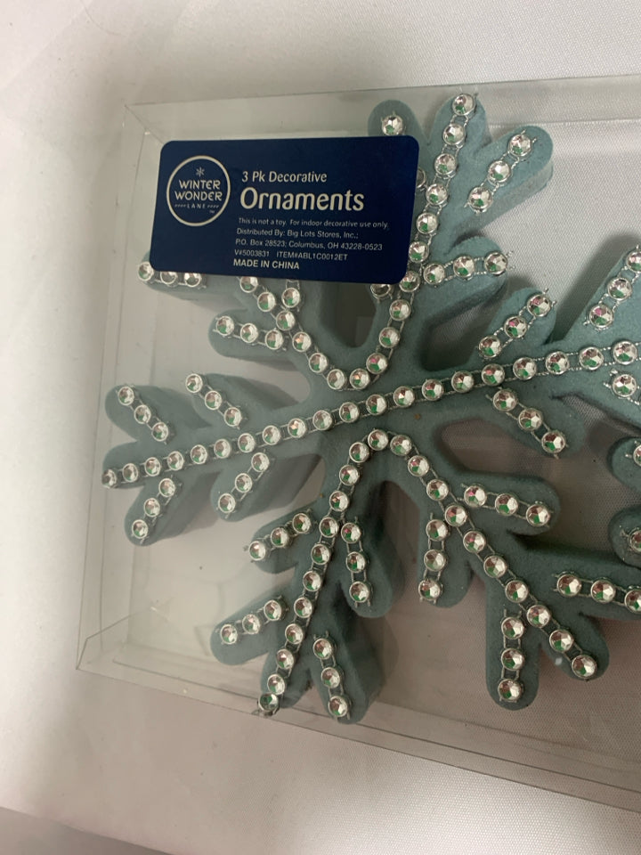 3 BLUE SNOWFLAKE ORNAMENTS.