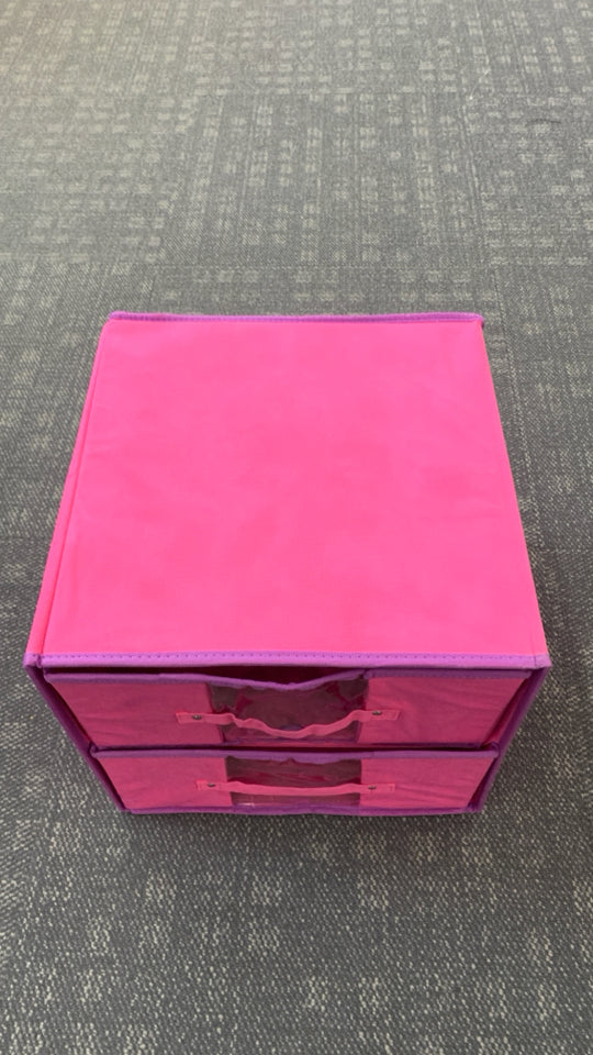 STACKED PINK & PURPLE COLLAPSING BINS.