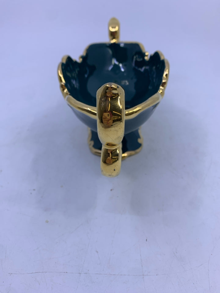 TEAL GOLD CERAMIC FOOTED OVAL PLANTER W/ FLOWER DESIGN SIGNED.