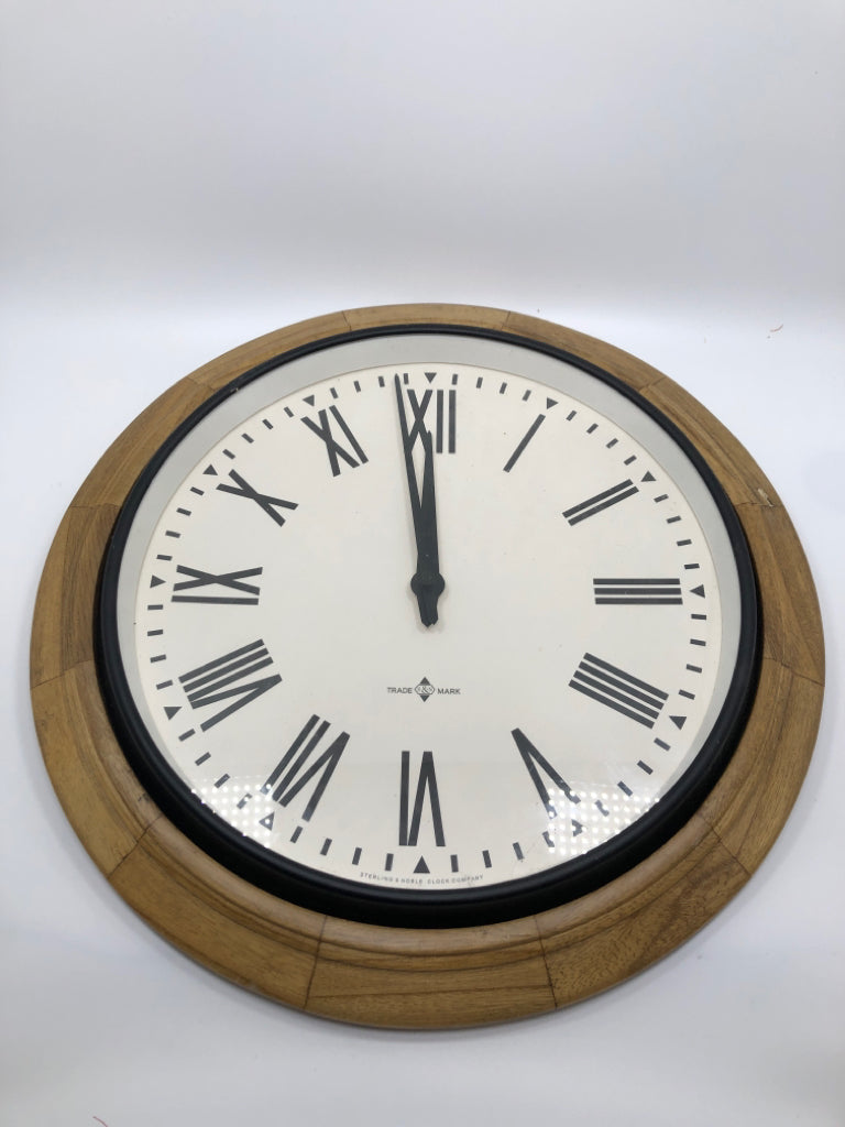 ROUND WOOD FRAMED WALL CLOCK.