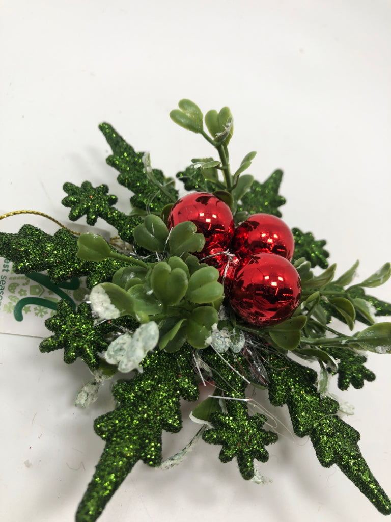 GREEN GLITTER SNOWFLAKE ORNAMENT W/HOLLY.