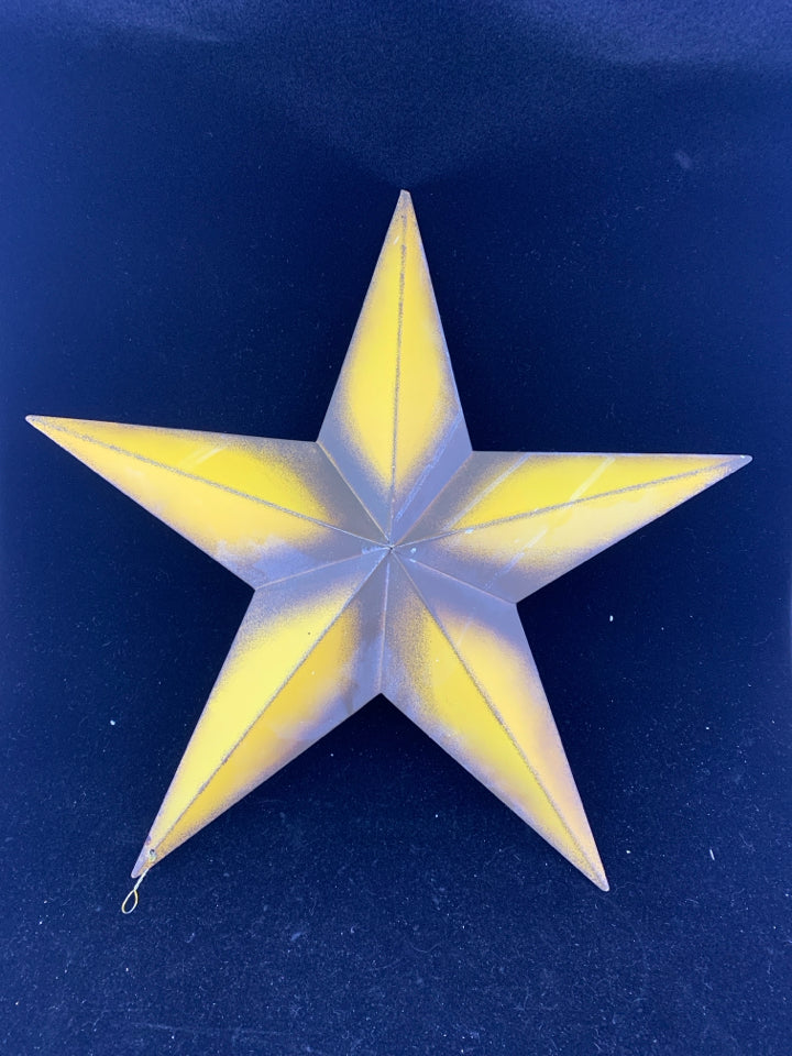 YELLOW METAL STAR.