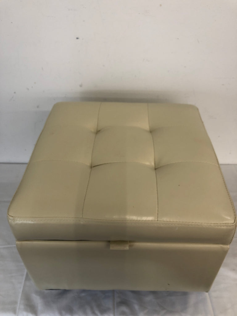 CREAM LEATHER STORAGE OTTOMAN.