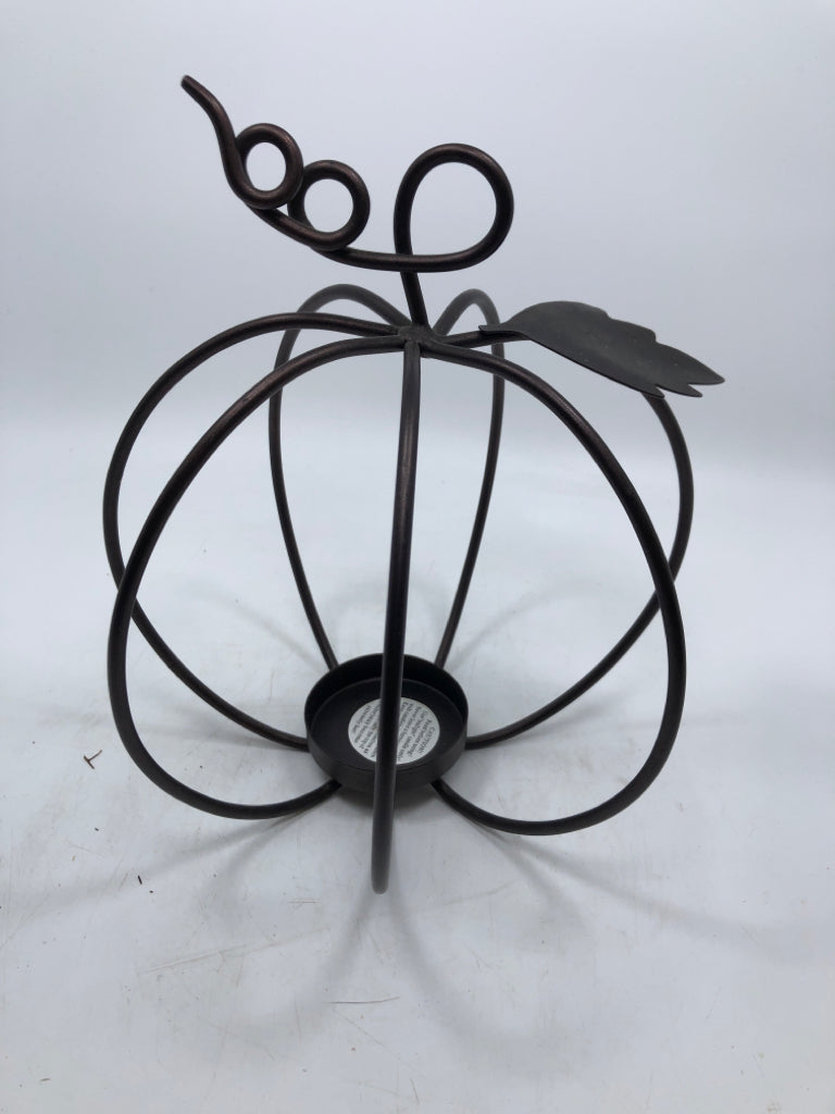 BROWN METAL CAGE PUMPKIN TEA LIGHT HOLDER.