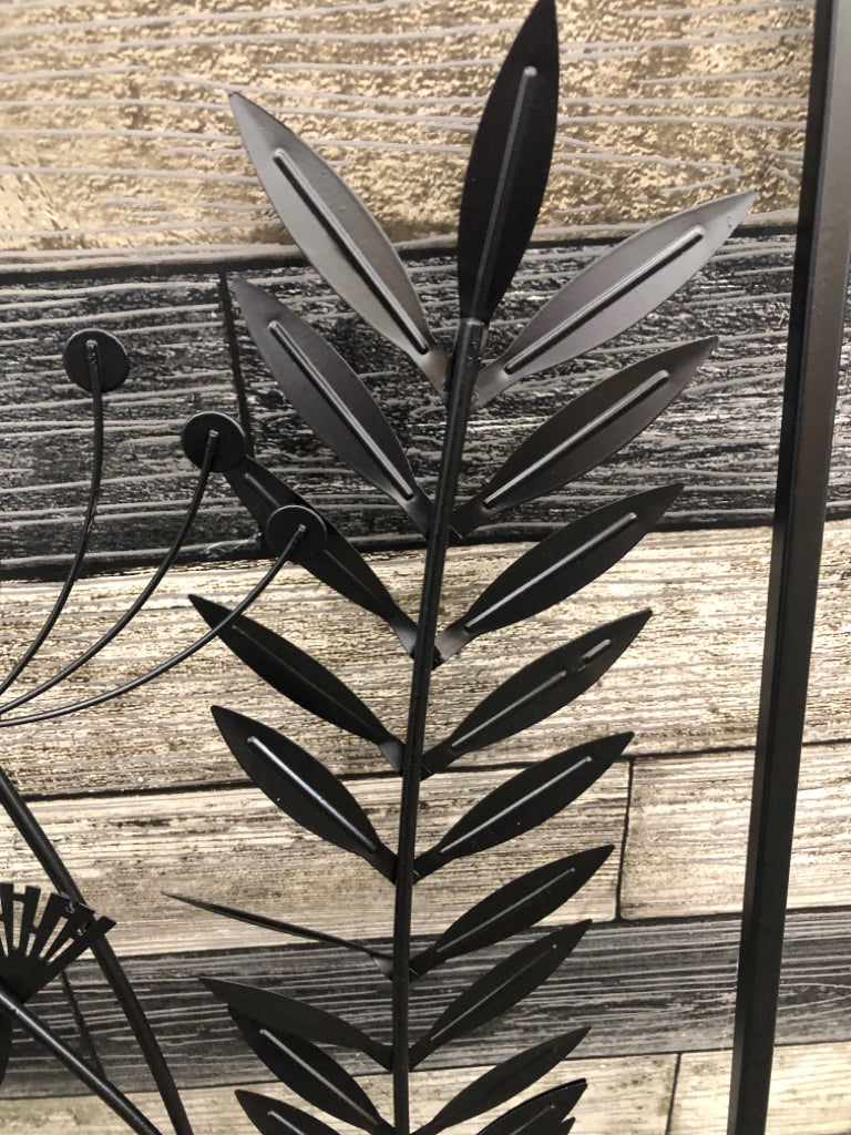 BLACK METAL DANDELION AND LEAVES WALL HANGING.