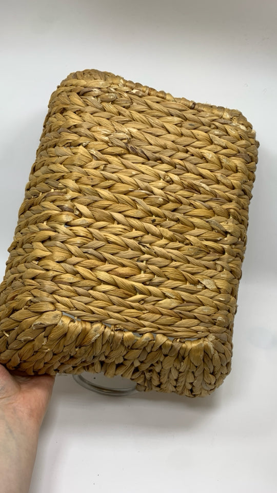 LONG WOVEN BASKET W/METAL HANDLES.