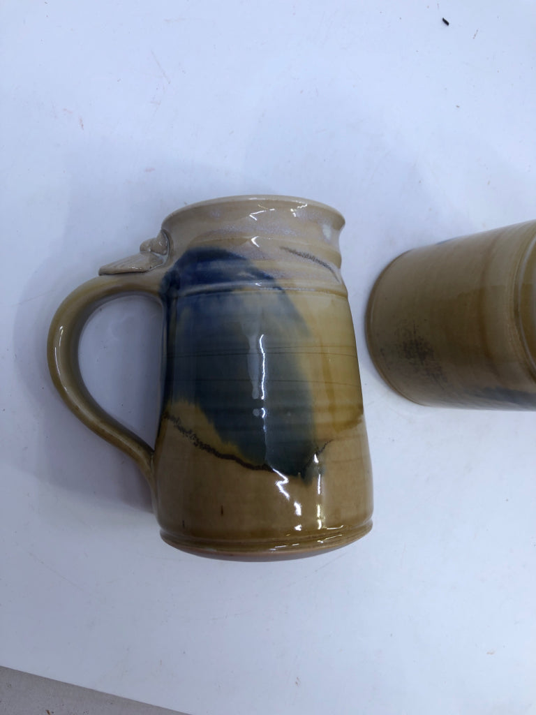 2 YELLOW + BLUE POTTERY GLAZE MUGS.