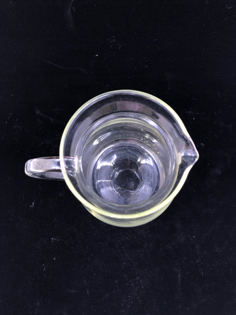 CLEAR GLASS PITCHER W HANDLE.