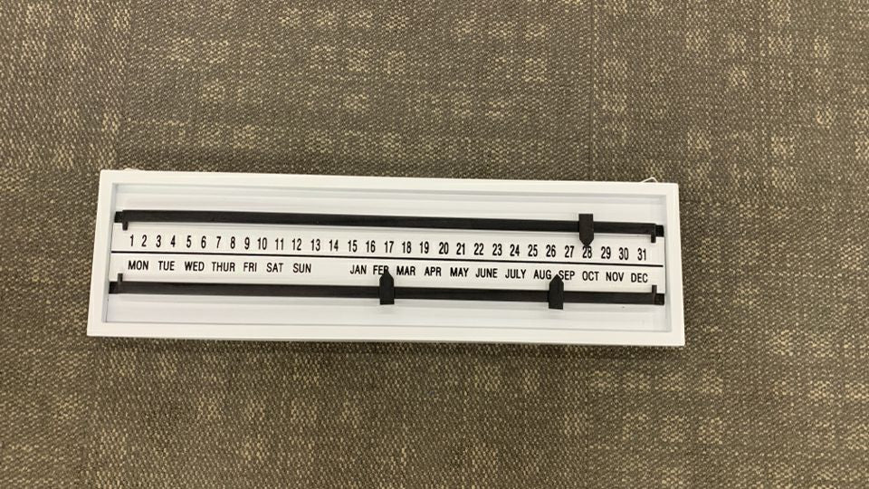 LIGHT BLUE SLIDING PERPETUAL CALENDAR.