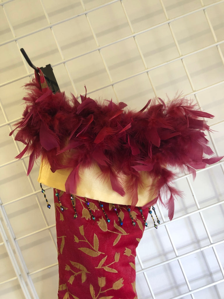 RED BOOT STOCKING W/FEATHERS.