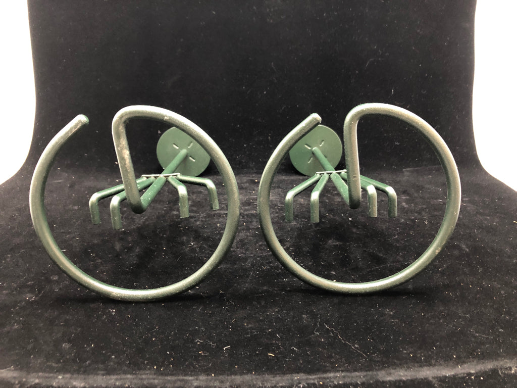 2 METAL GREEN TAPER CANDLE HOLDERS.