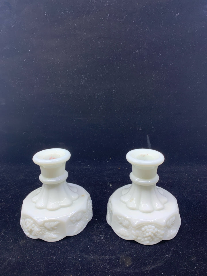 2 VTG MILK GLASS EMBOSSED CANDLE HOLDERS.