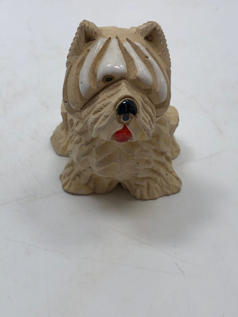 SM CARVED DOG W/TONGUE OUT.