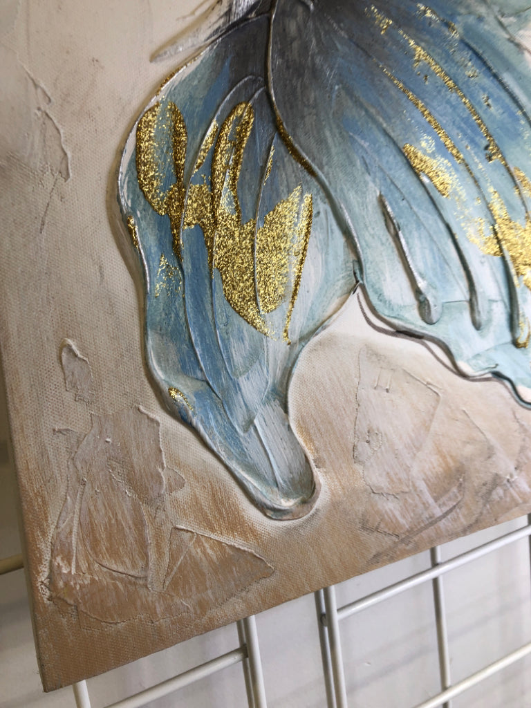 BLUE BUTTERFLY PAINTED CANVAS.