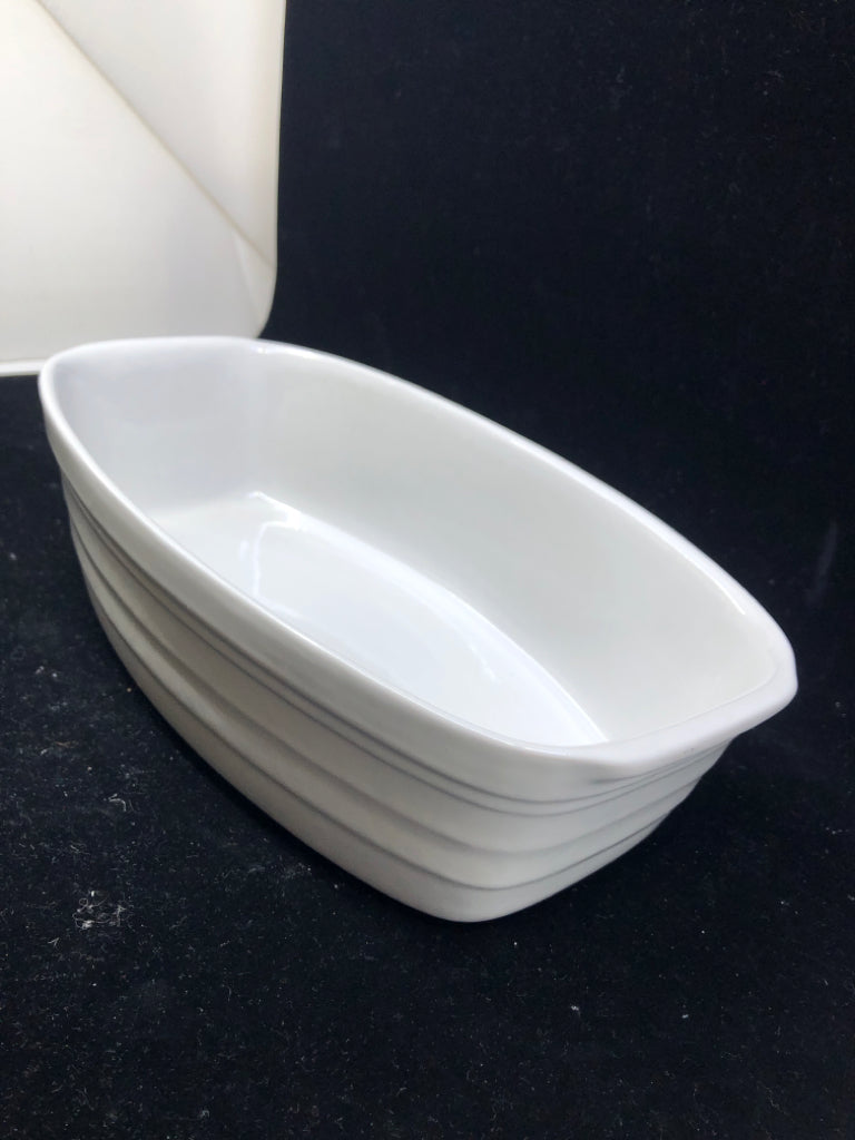 WHITE RIBBED CASSEROLE DISH.