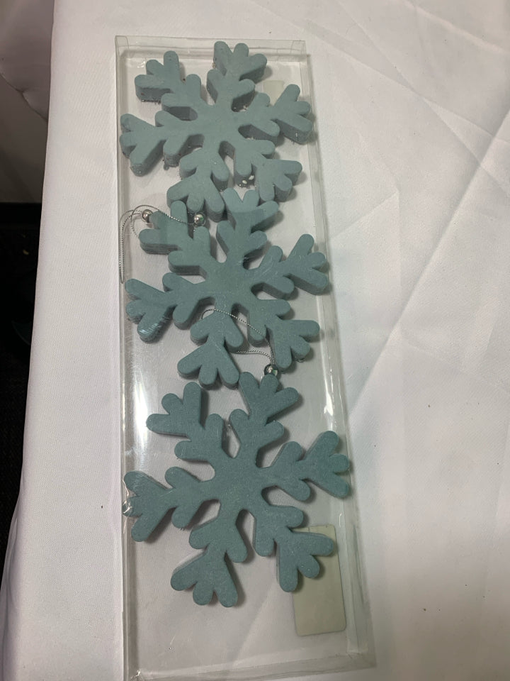 3 BLUE SNOWFLAKE ORNAMENTS.
