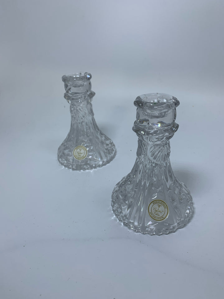 2 FOOTED CRYSTAL TAPERED CANDLE HOLDERS.
