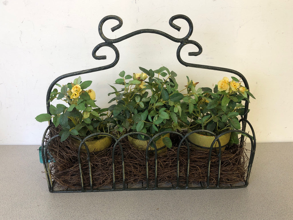3 POT YELLOW FAUX FLOWER IN GREEN WIRE HOLDER.