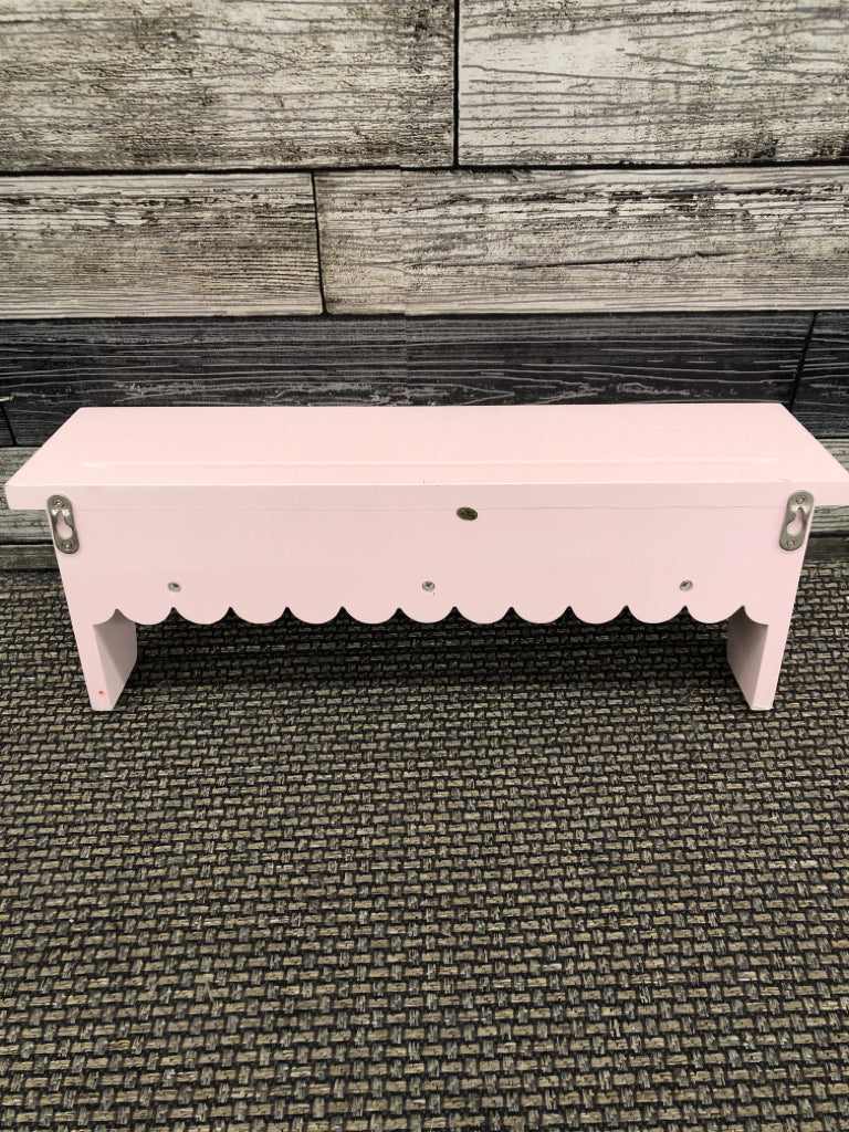 PINK WOOD WALL SHELF W/COAT HOOKS.